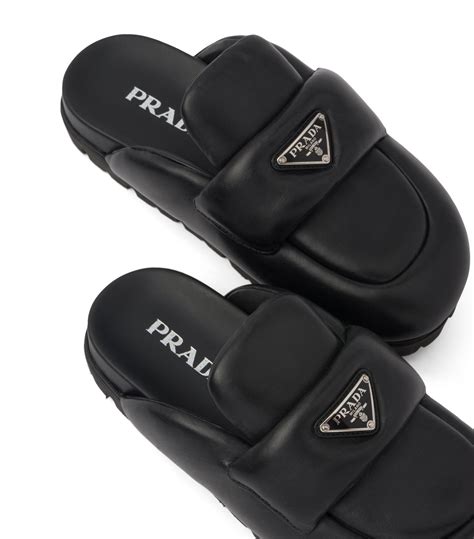 prada pebbled leather black mule logo|Prada leather mules.